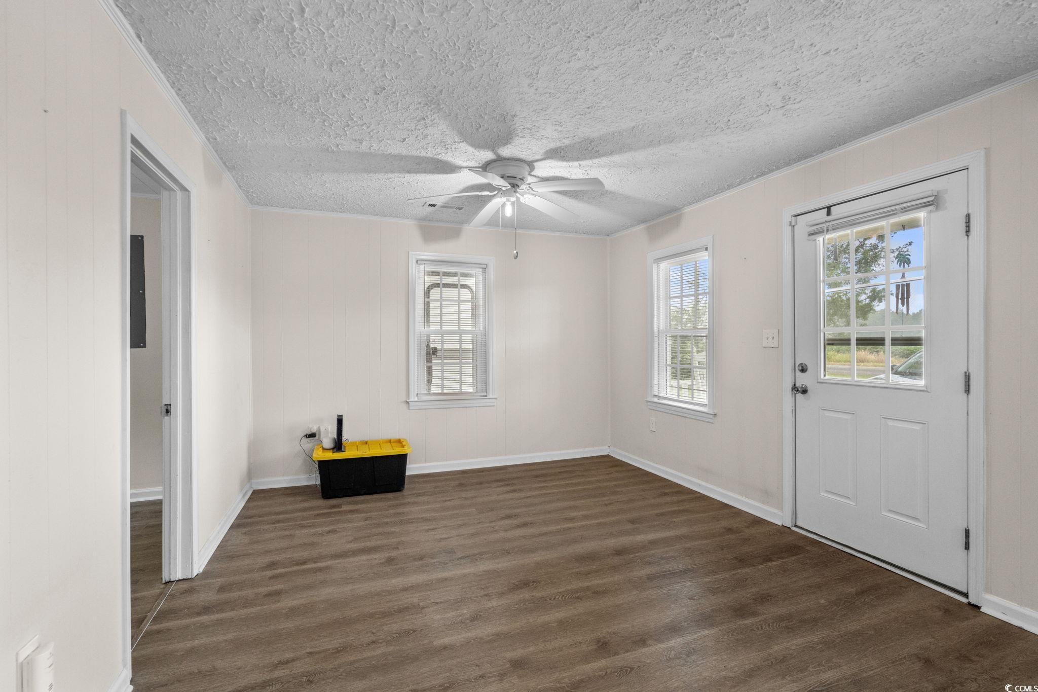 2475 Beverly Road Conway, SC 29527 - Photo 11 of 34 Entryway featuring dark wood finished floors, ceiling fan, a textured ceiling, and ornamental molding