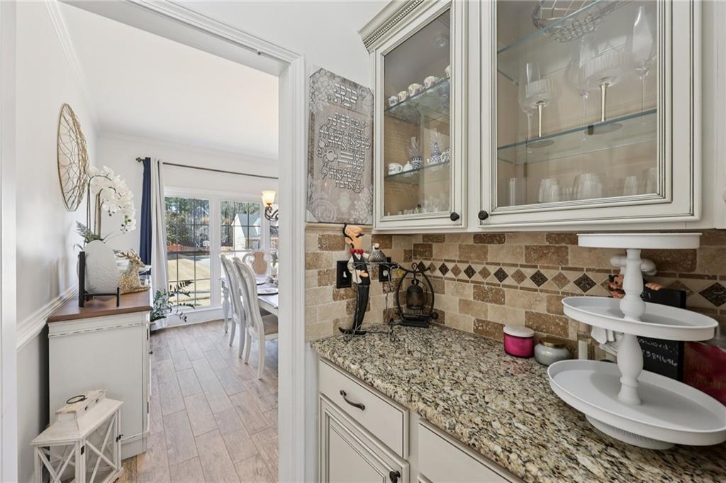 704 Highland Ridge Pointe Lawrenceville, GA 30045 - Photo 11 of 36 a kitchen with sink and refrigerator