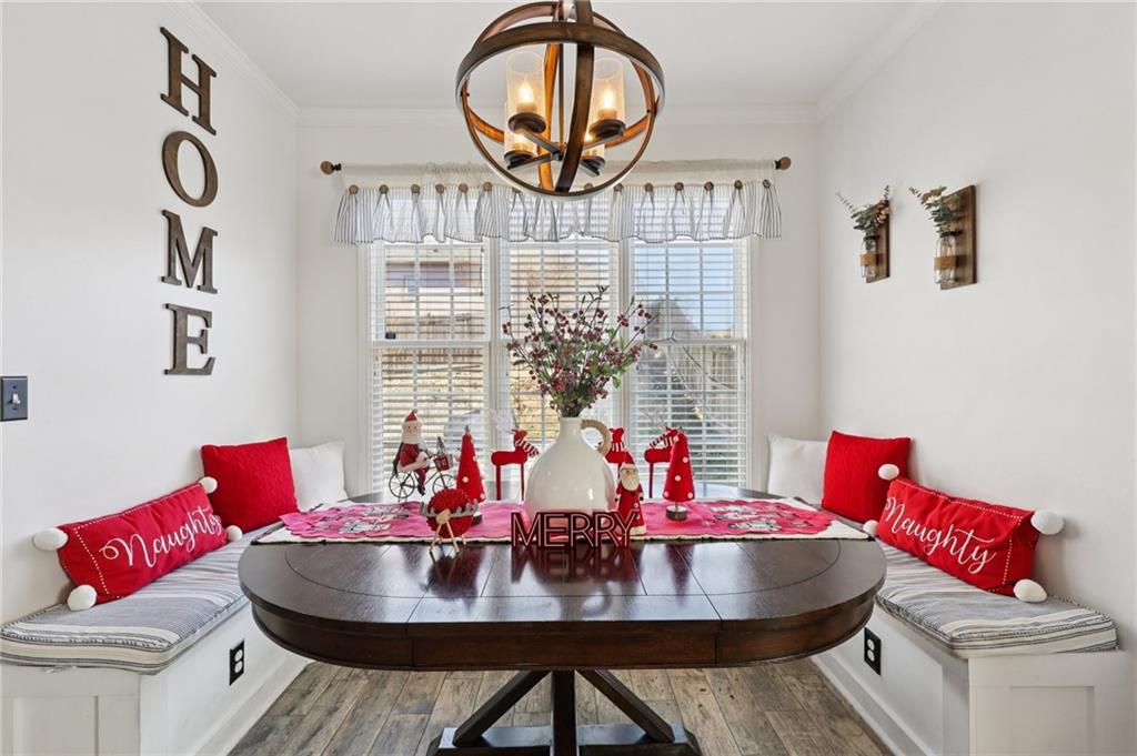 704 Highland Ridge Pointe Lawrenceville, GA 30045 - Photo 12 of 36 a living room with furniture and a large window