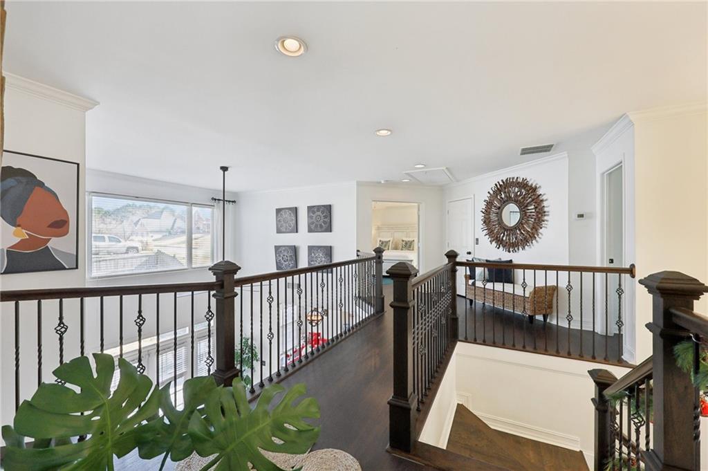 704 Highland Ridge Pointe Lawrenceville, GA 30045 - Photo 15 of 36 a view of a porch with wooden floor