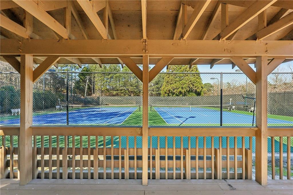 704 Highland Ridge Pointe Lawrenceville, GA 30045 - Photo 34 of 36 a view of outdoor space with deck and a garden