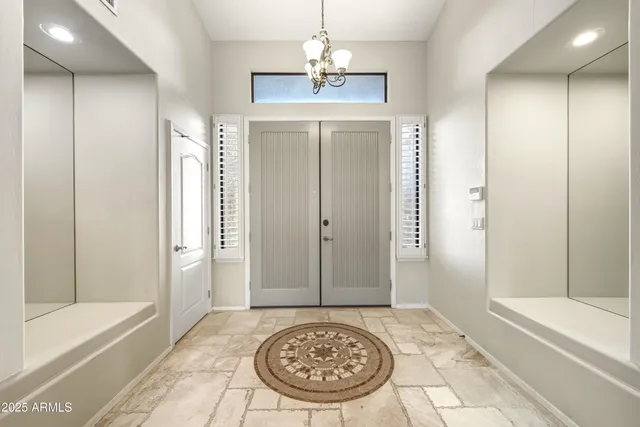 a view of a bathroom with bathtub and shower