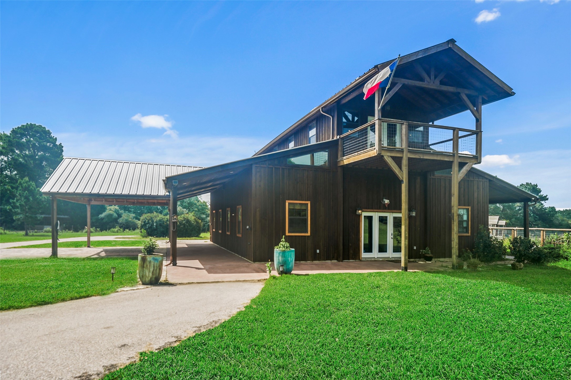 26534 Mitchell Road Hempstead, TX 77445 - Photo 1 of 45 a front view of a house with a yard