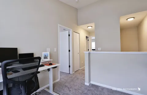 a view of workspace with wooden floor