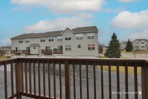 a view of a street view from a balcony