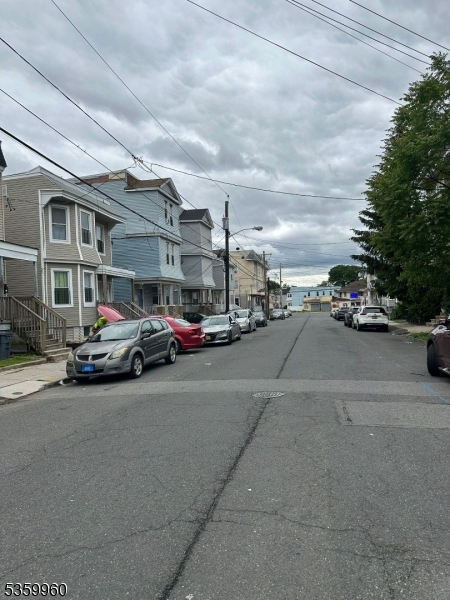 249 21st Street Irvington, NJ 07111 - Photo 3 of 4 a view of street with parked cars