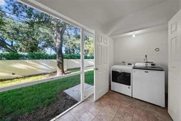 a view of yard with swimming pool