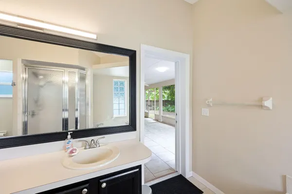 a bathroom with a sink and a mirror