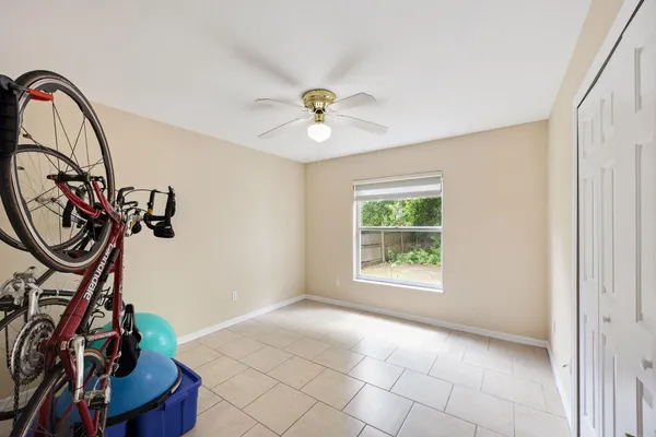 a view of a livingroom with gym equipment