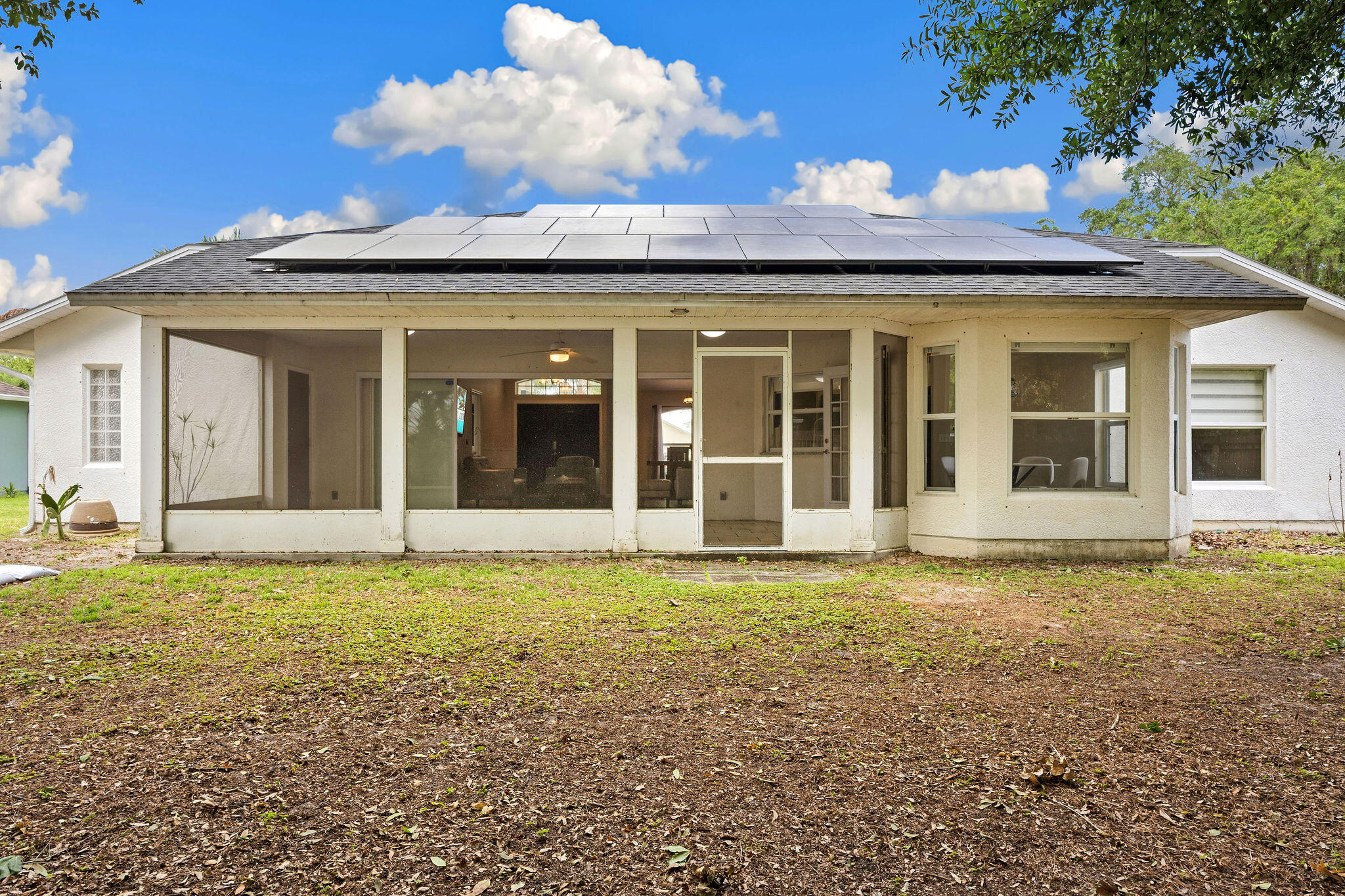 720 Bayfront Terrace Sebastian, FL 32958 - Photo 31 of 33 a view of a house with a garden