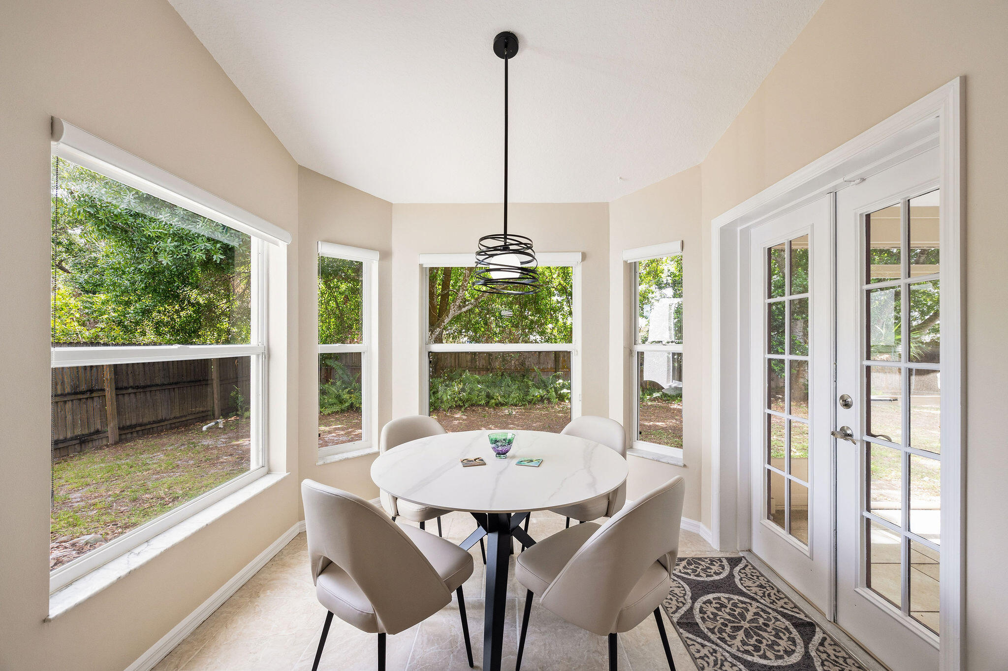720 Bayfront Terrace Sebastian, FL 32958 - Photo 9 of 33 a view of a dining room with furniture window and wooden floor