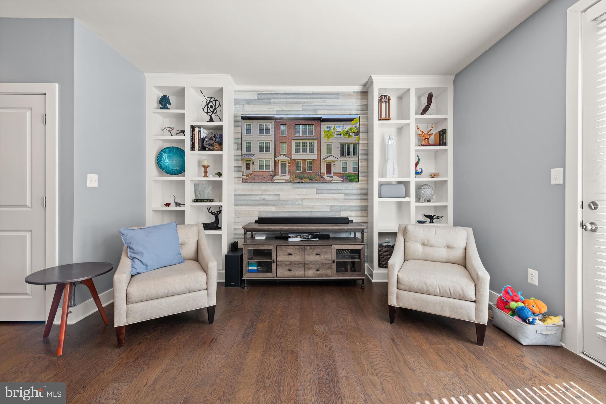135 Klee Alley Silver Spring, MD 20906 - Photo 11 of 37 a living room with furniture and a wooden floor