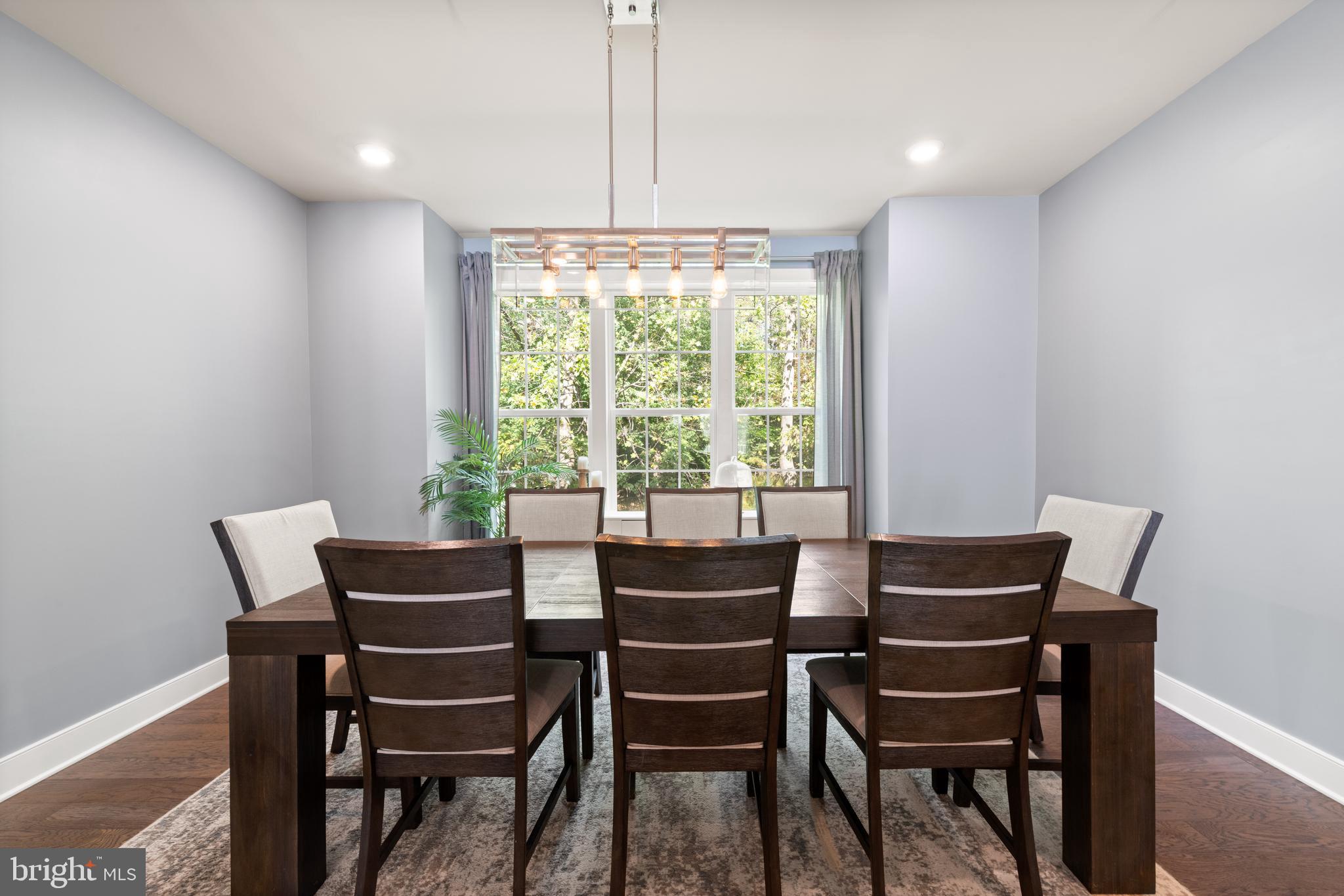 135 Klee Alley Silver Spring, MD 20906 - Photo 16 of 37 a dining room with furniture and window