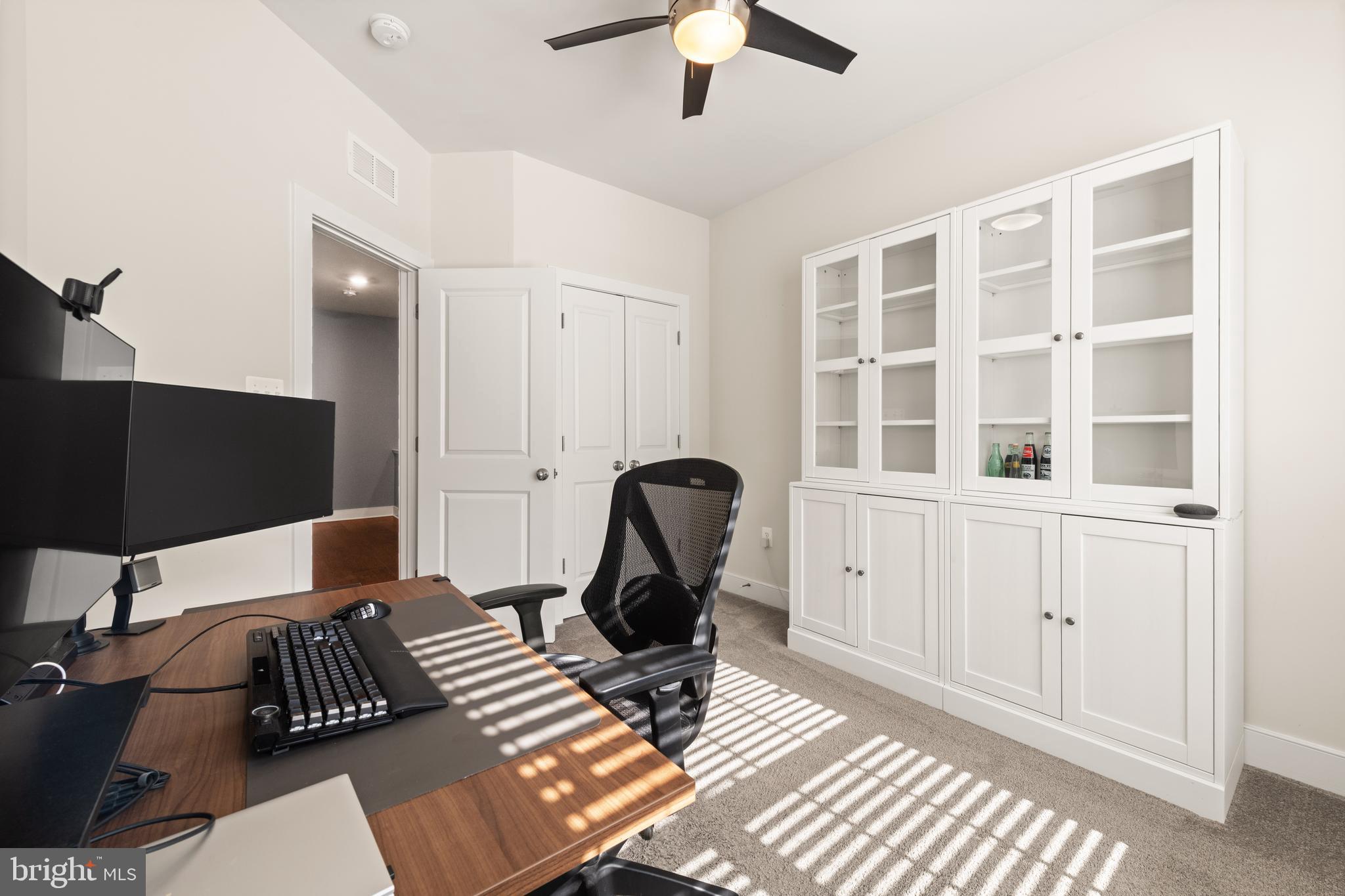 135 Klee Alley Silver Spring, MD 20906 - Photo 27 of 37 a work room with furniture and a window