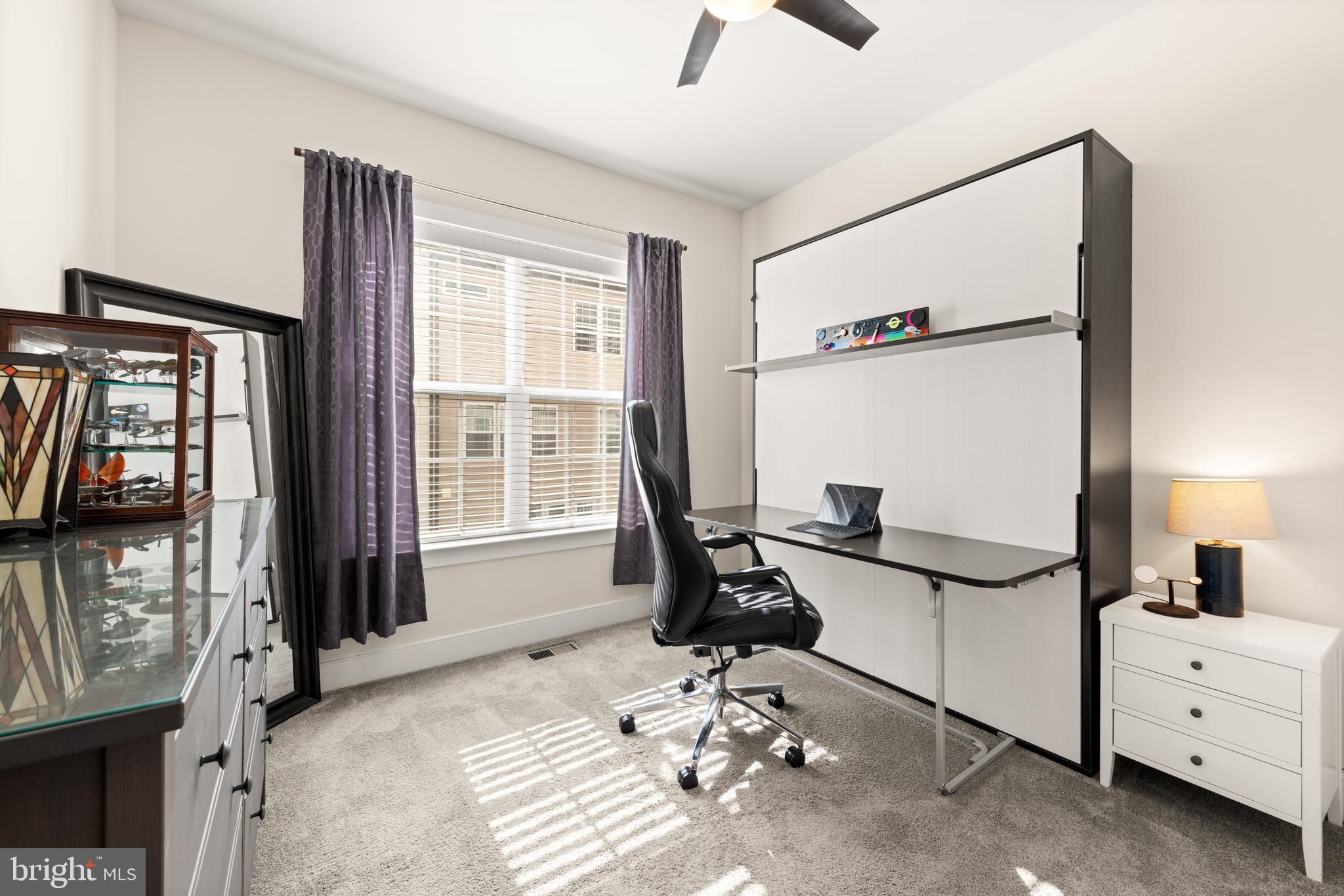 135 Klee Alley Silver Spring, MD 20906 - Photo 30 of 37 a view of a room with gym equipment