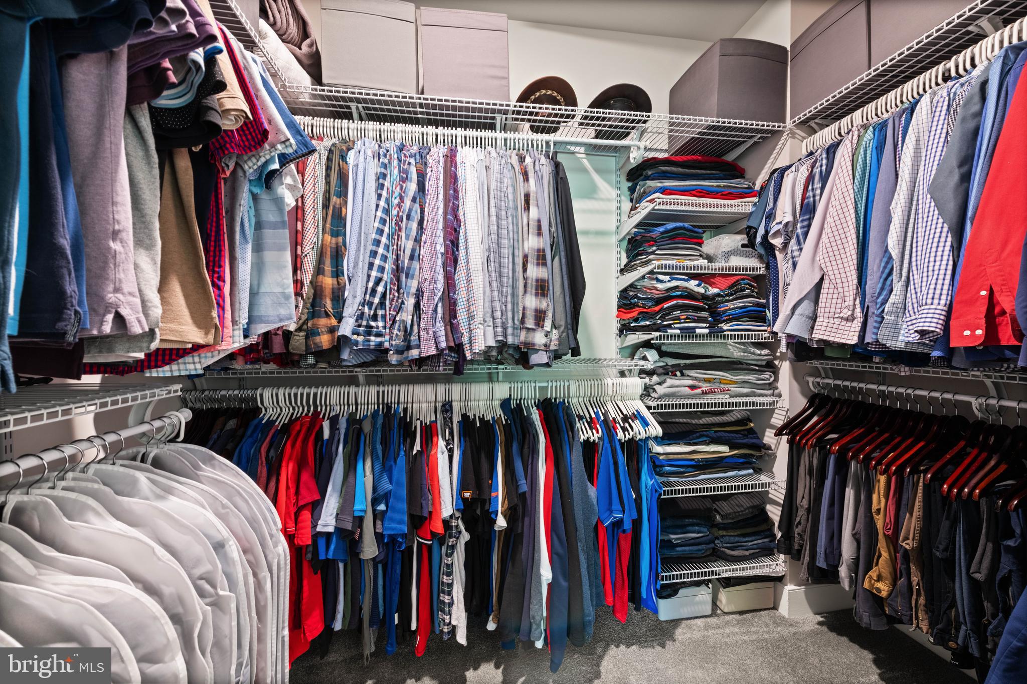 135 Klee Alley Silver Spring, MD 20906 - Photo 35 of 37 a view of walk in closet with clothes