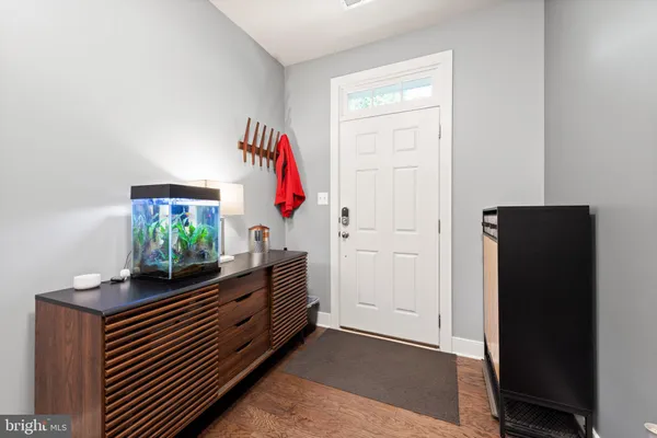 a room with furniture and wooden floor