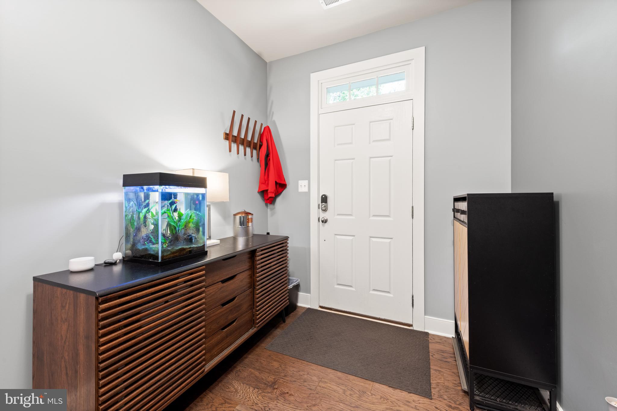 135 Klee Alley Silver Spring, MD 20906 - Photo 4 of 37 a room with furniture and wooden floor
