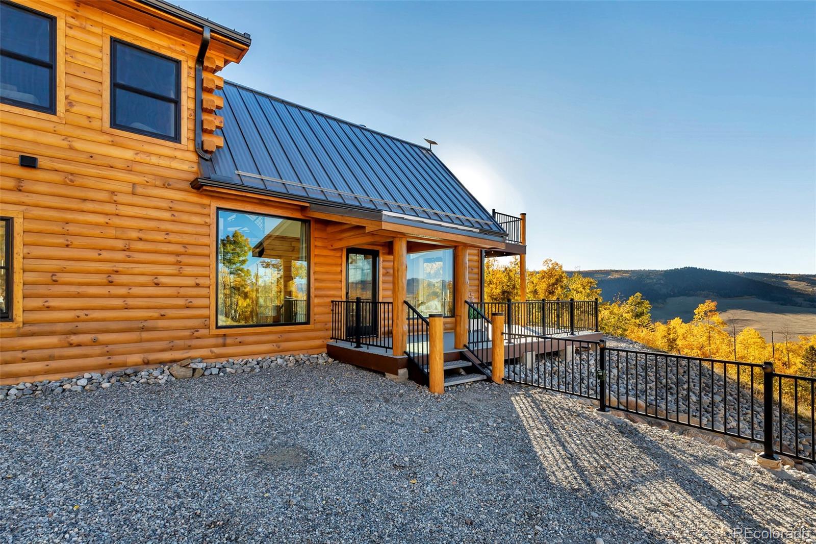 1023 Mexican Ridge Circle Como, CO 80432 - Photo 21 of 50 a view of a house with wooden floor in front of house