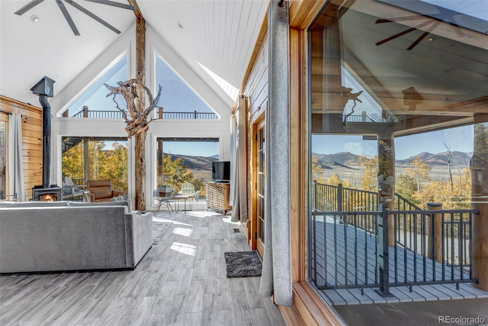 1023 Mexican Ridge Circle Como, CO 80432 - Photo 32 of 50 a view of living room with furniture and floor to ceiling window