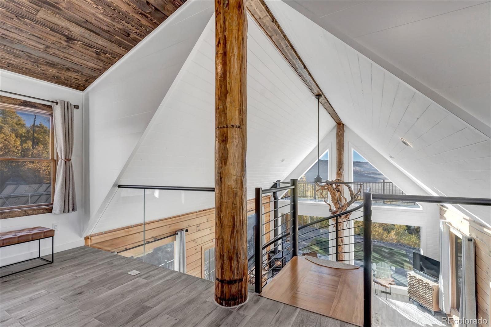 1023 Mexican Ridge Circle Como, CO 80432 - Photo 42 of 50 a view of entryway and hall with wooden floor