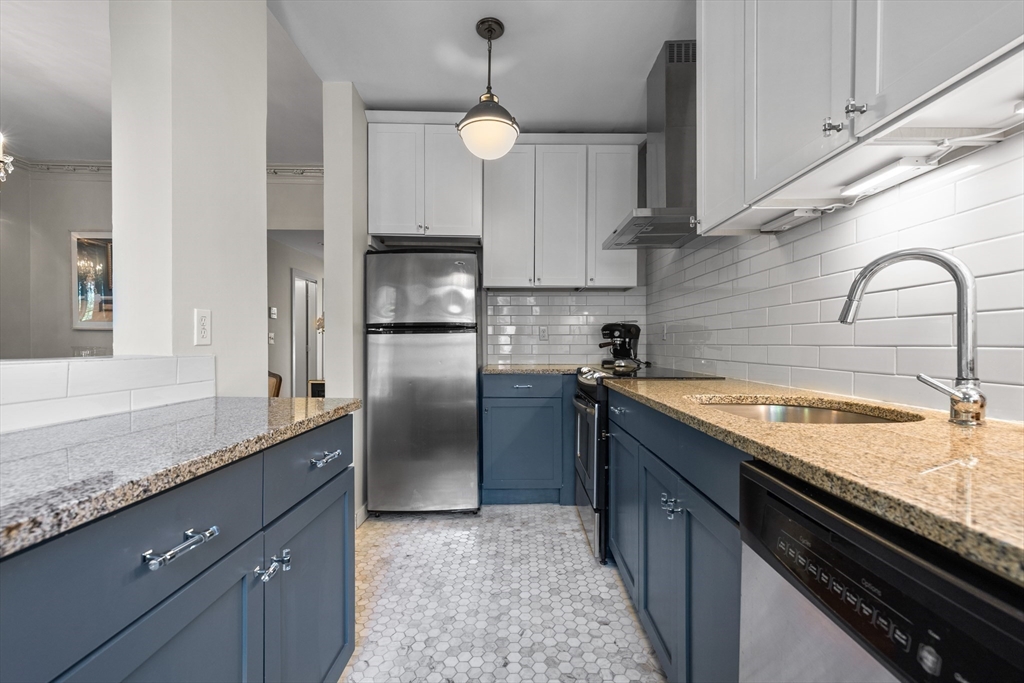 88 Worcester Street, Unit 4 Boston, MA 02118 - Photo 11 of 24 a kitchen with granite countertop stainless steel appliances and a counter space
