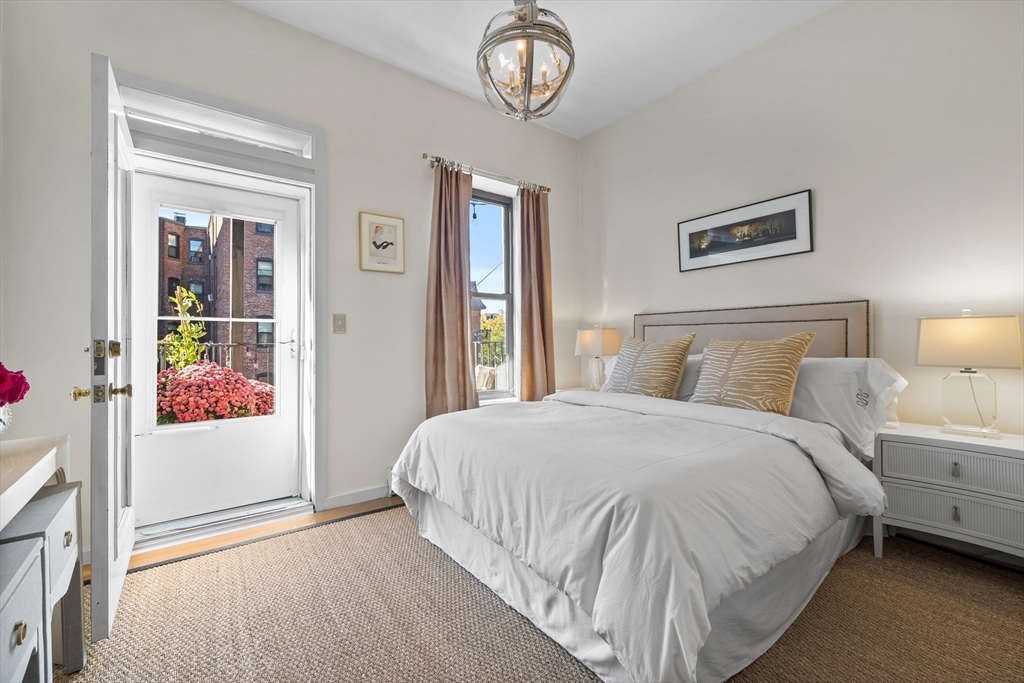 88 Worcester Street, Unit 4 Boston, MA 02118 - Photo 13 of 24 a bedroom with a bed and a window