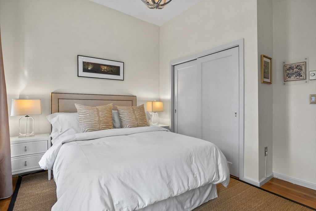 88 Worcester Street, Unit 4 Boston, MA 02118 - Photo 16 of 24 a bedroom with a bed and night stand