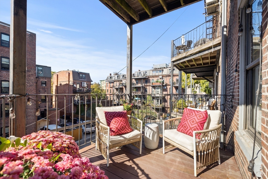 88 Worcester Street, Unit 4 Boston, MA 02118 - Photo 20 of 24 a outdoor living space with patio furniture and a potted plant
