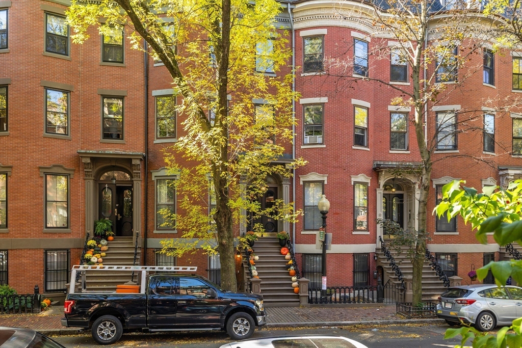 88 Worcester Street, Unit 4 Boston, MA 02118 - Photo 23 of 24 a view of a brick building with many windows