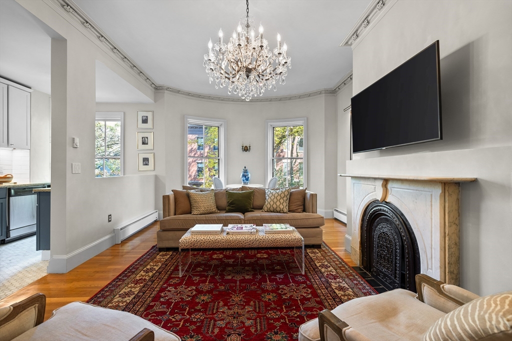 88 Worcester Street, Unit 4 Boston, MA 02118 - Photo 3 of 24 a living room with furniture and a flat screen tv