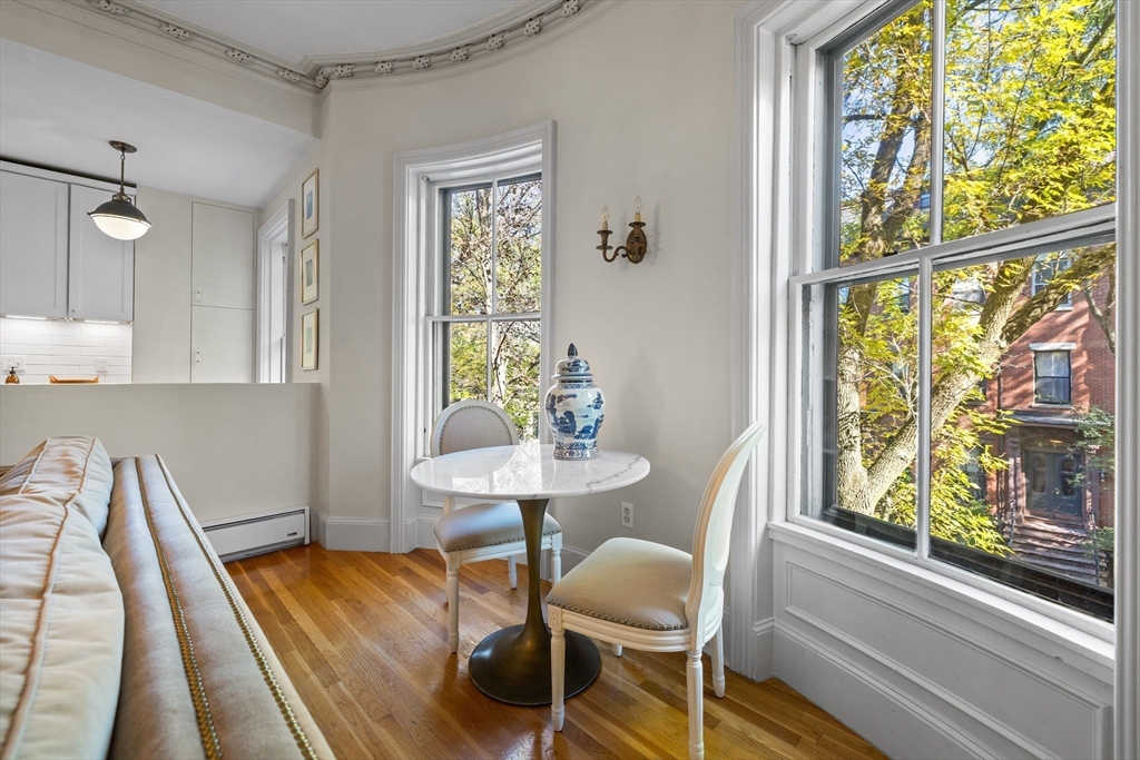 88 Worcester Street, Unit 4 Boston, MA 02118 - Photo 8 of 24 a dining room with furniture and window