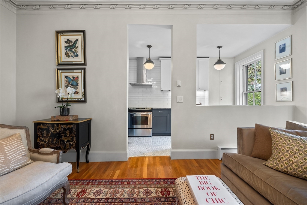 88 Worcester Street, Unit 4 Boston, MA 02118 - Photo 9 of 24 a living room with furniture and painting on the wall