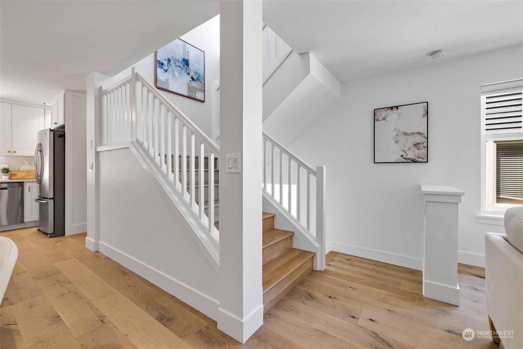 3613 22nd Avenue West, Unit B Seattle, WA 98199 - Photo 17 of 35 a view of entryway and hall with wooden floor