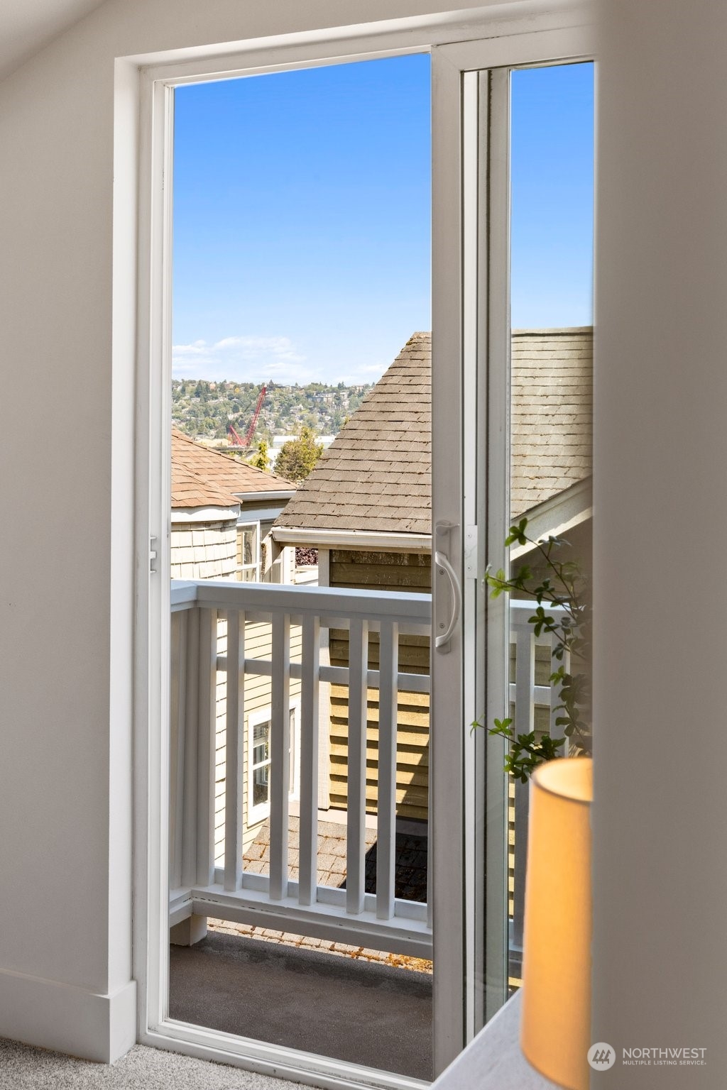 3613 22nd Avenue West, Unit B Seattle, WA 98199 - Photo 20 of 35 a view of a glass door and a yard
