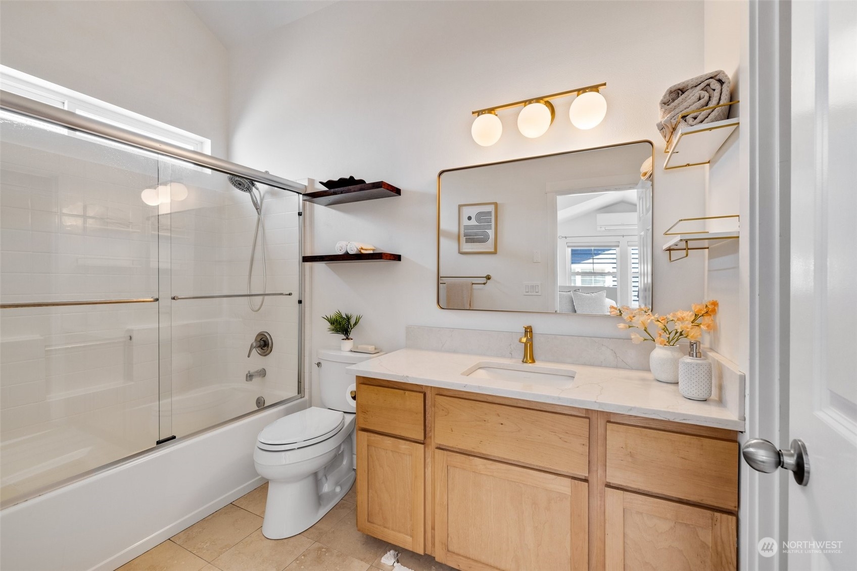 3613 22nd Avenue West, Unit B Seattle, WA 98199 - Photo 22 of 35 a bathroom with a sink toilet and shower