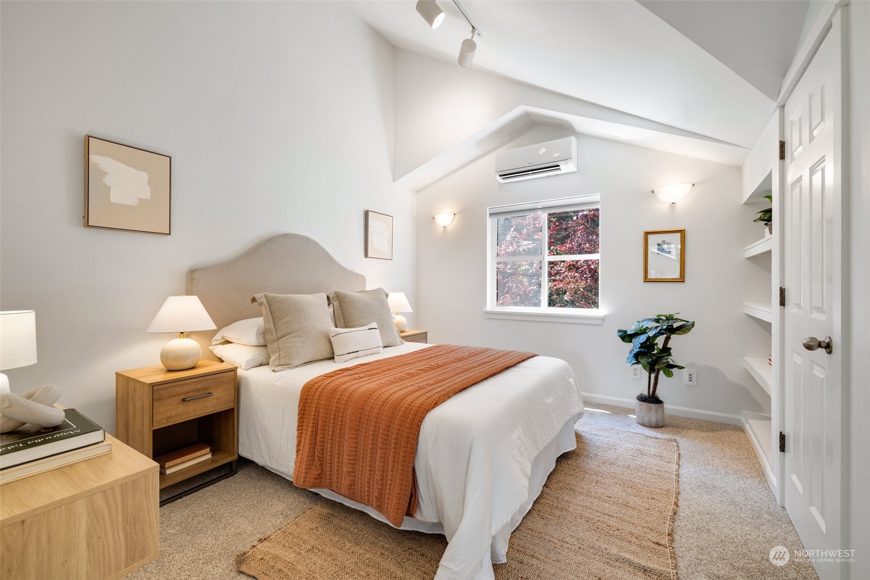 3613 22nd Avenue West, Unit B Seattle, WA 98199 - Photo 24 of 35 a bedroom with bed and a window