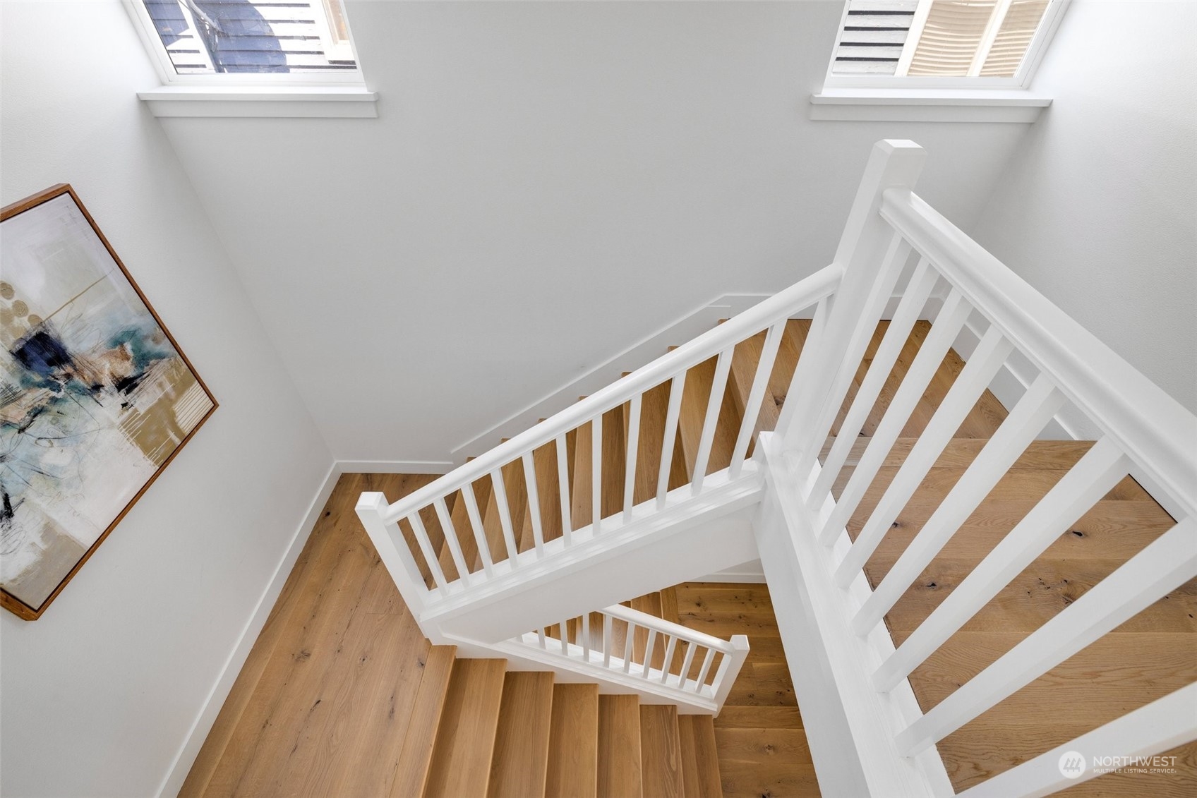 3613 22nd Avenue West, Unit B Seattle, WA 98199 - Photo 28 of 35 a view of staircase with white walls and a window