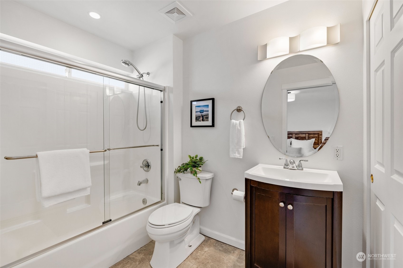 3613 22nd Avenue West, Unit B Seattle, WA 98199 - Photo 31 of 35 a bathroom with a sink toilet and shower