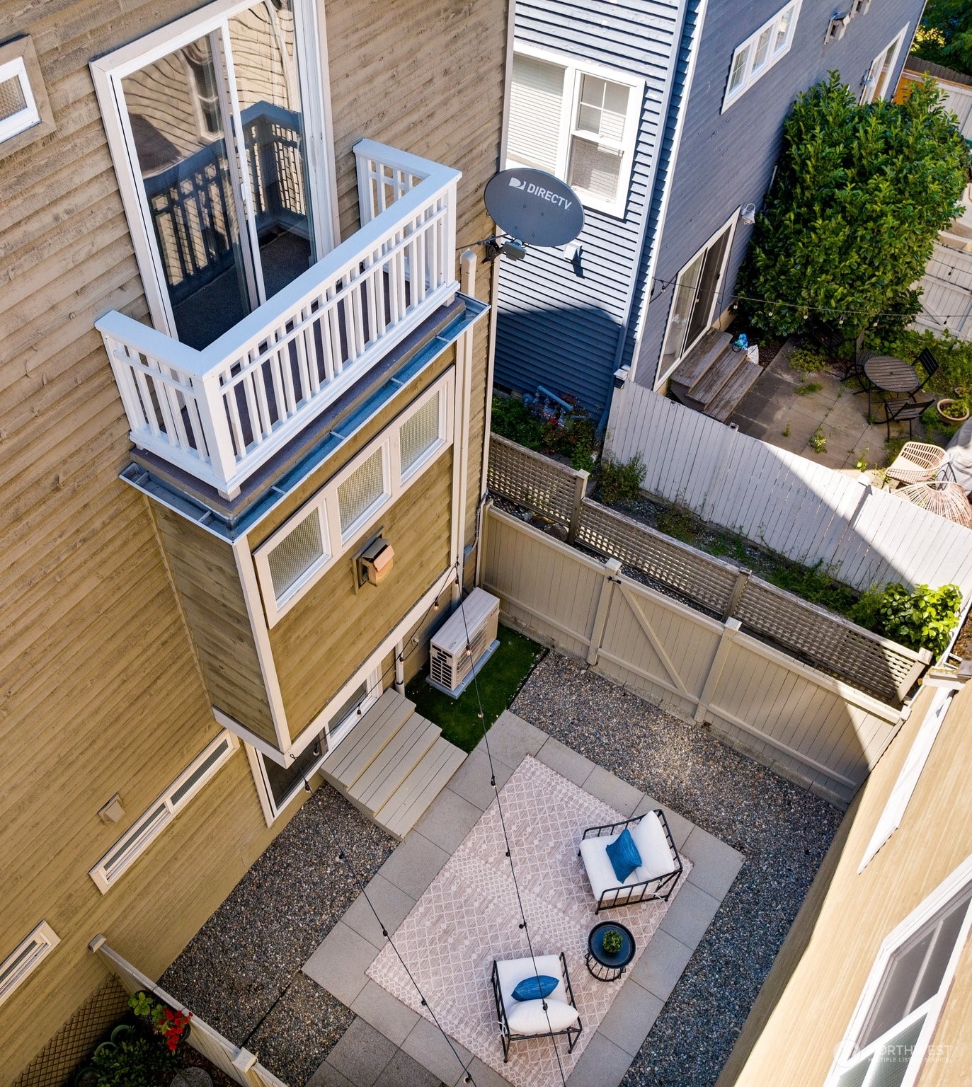 3613 22nd Avenue West, Unit B Seattle, WA 98199 - Photo 33 of 35 a view of an outdoor sitting area with wooden fence