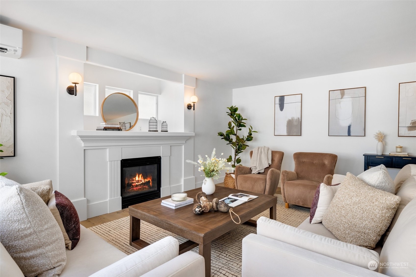 3613 22nd Avenue West, Unit B Seattle, WA 98199 - Photo 5 of 35 a living room with furniture and a fireplace