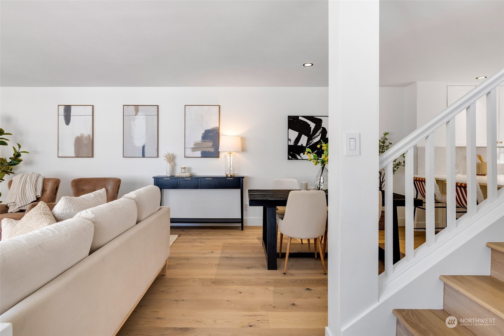 3613 22nd Avenue West, Unit B Seattle, WA 98199 - Photo 7 of 35 a living room with furniture and wooden floor