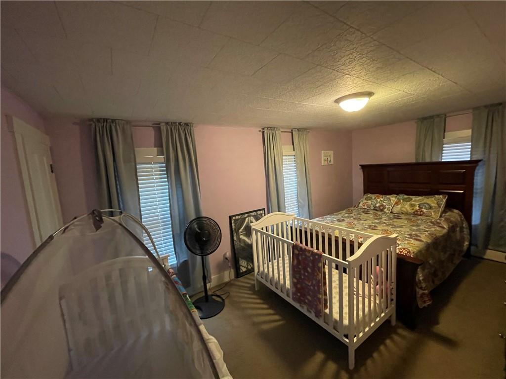 30 Fisher Street Commodore, PA 15729 - Photo 11 of 13 a bedroom with a bed and a window