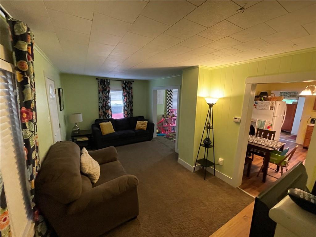 30 Fisher Street Commodore, PA 15729 - Photo 2 of 13 a living room with furniture and a flat screen tv