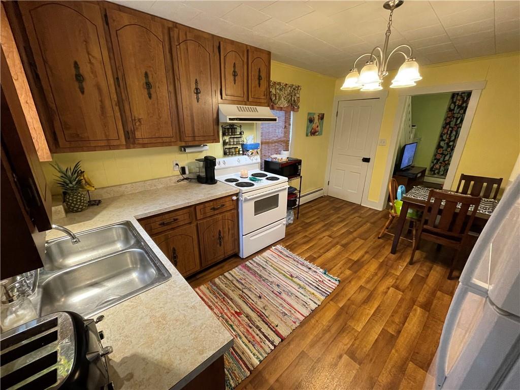 30 Fisher Street Commodore, PA 15729 - Photo 3 of 13 a kitchen with a sink appliances and cabinets