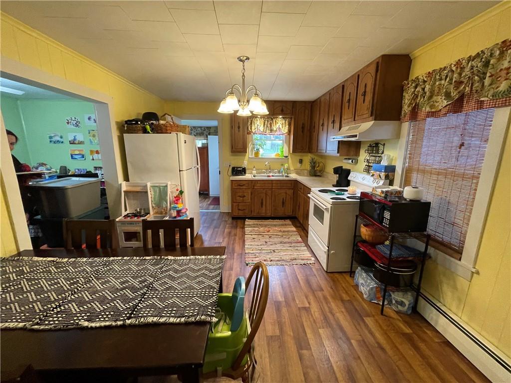 30 Fisher Street Commodore, PA 15729 - Photo 7 of 13 a view of a dining room with furniture window and wooden floor