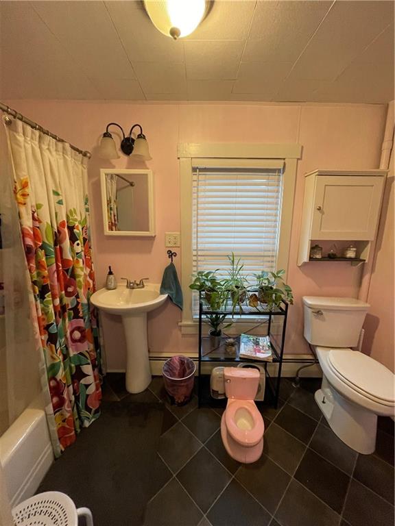 30 Fisher Street Commodore, PA 15729 - Photo 9 of 13 a bathroom with a toilet sink and mirror