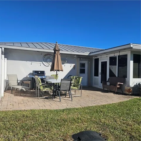 a view of a garden with an outdoor space