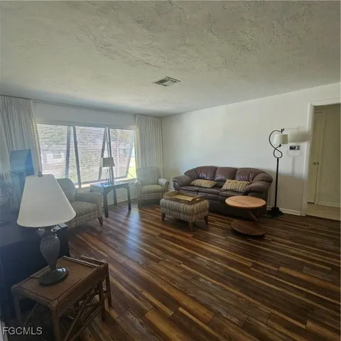 a utility room with sink dryer and washer