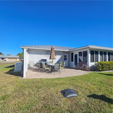 a view of a house with patio
